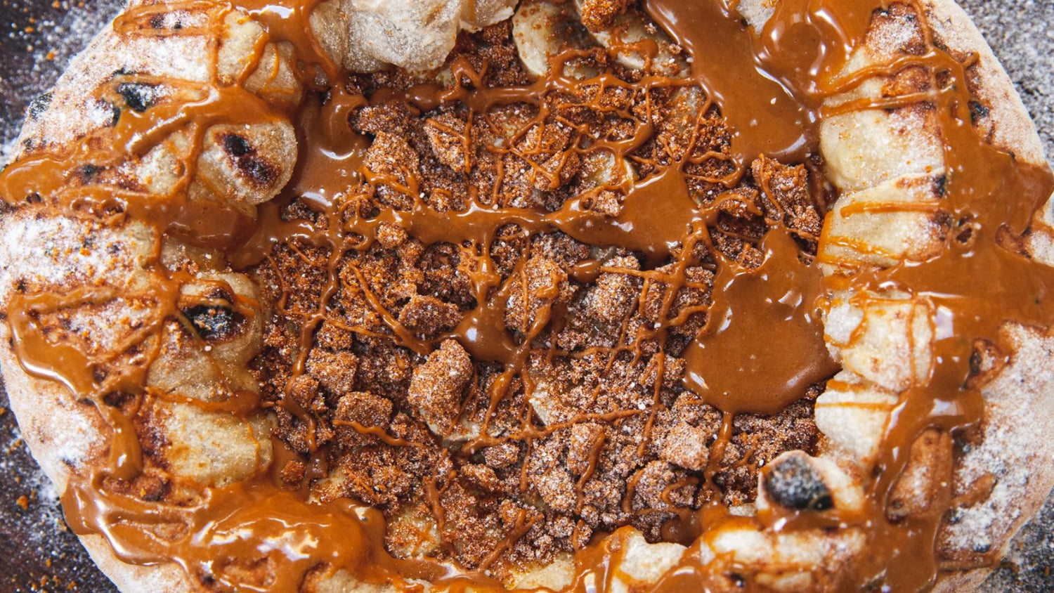 Pizza covered in chocolate recipe poster image