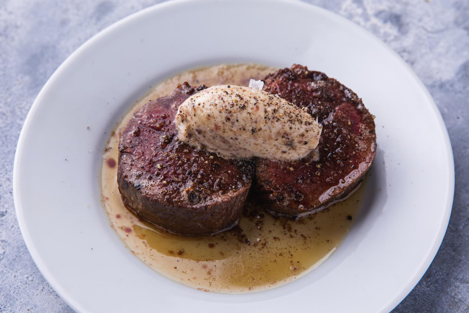 Filet Mignon with bone marrow butter recipe poster image