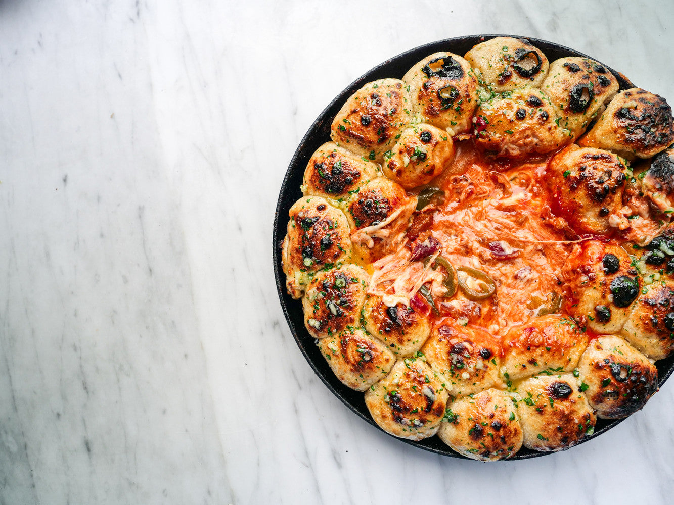 https://nz.gozney.com/cdn/shop/articles/Pizza_Bites_Feng_Chen__leopardcrust_2.jpg?v=1731561300