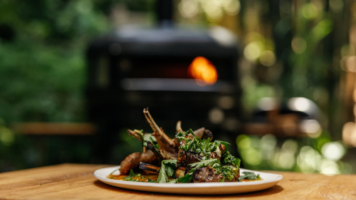 Wood-Fired Oven Roasted Lamb Chops in front of Dome (Second Generation)